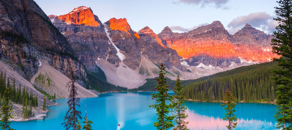 Panoramic view of sea and mountains against sky