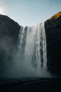 Scenic view of the waterfall skogafoss against sky