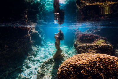 Man swimming in sea