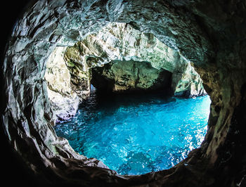 High angle view of rock formation in sea