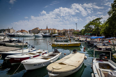 Boats moored in harbor