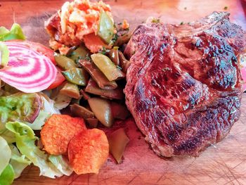 High angle view of chopped vegetables on cutting board