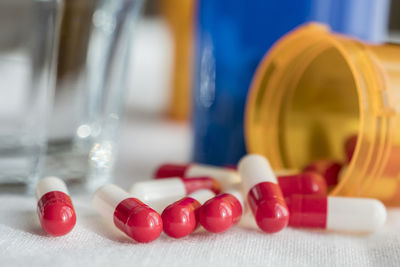 Close-up of red wine bottles on table