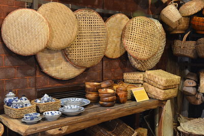 Stack of wicker basket on table at market stall