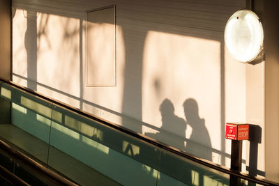 Shadow of people on wall