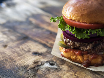 Close-up of hamburger on table