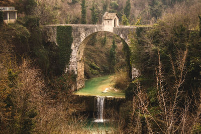 Arch bridge over river