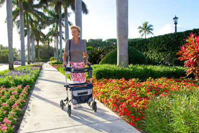 Woman with mobility walker outdoors