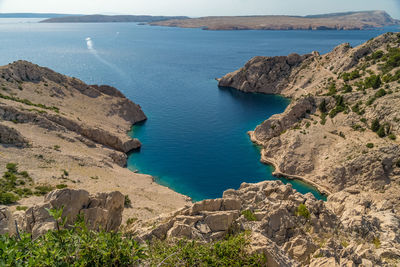 High angle view of sea and rock formation