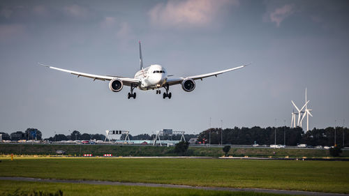 Airplane flying in sky