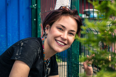 Portrait of a female volunteer at a dog shelter. woman working in animal shelter. 