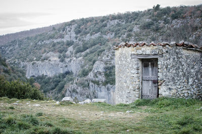 View of castle on mountain against sky