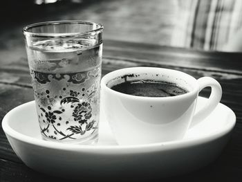 Close-up of coffee cup on table