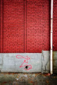 Graffiti on brick wall