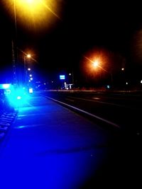 Illuminated street at night