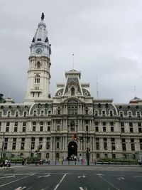 Building against cloudy sky