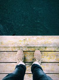 Low section of person standing on ground