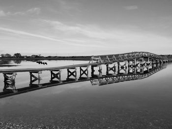 Bridge over river against sky