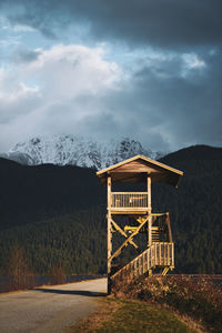 Built structure on land against sky