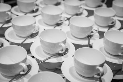 High angle view of coffee cups on table