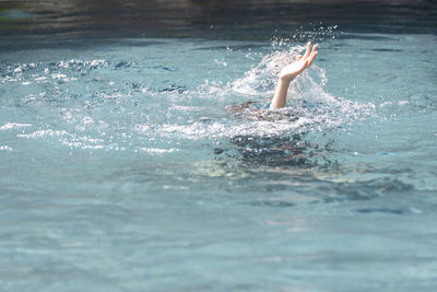 Man swimming in sea