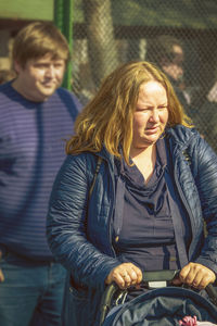 Close-up of mother and daughter outdoors