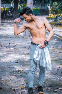 Rear view of man standing in park
