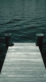 Wooden jetty on pier over lake