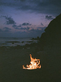 Scenic view of sea against sky at night