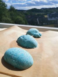 Close-up of blue eggs on table