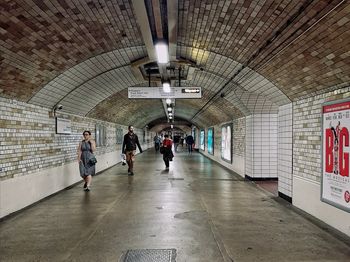 People walking in subway station