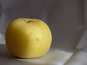 Close-up of apple on table