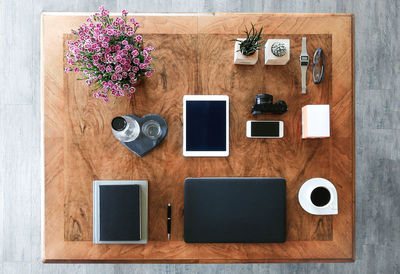 Directly above shot of various technologies on table