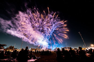 Firework display at night