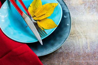 High angle view of multi colored umbrellas on table