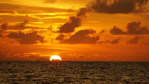 Scenic view of sunset over sea