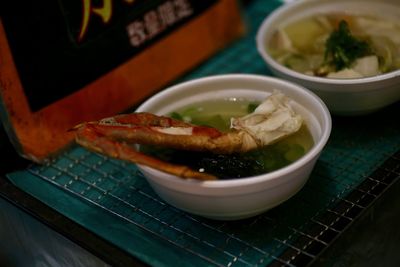 High angle view of japanese snow crab leg in a bowl of miso soup