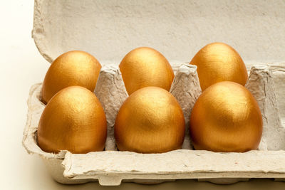 High angle view of pumpkins in box