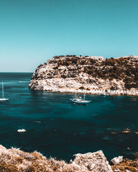 Scenic view of sea against clear sky