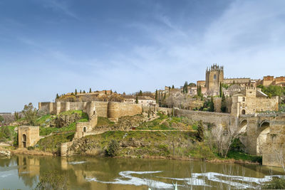 View of monastery of san juan de los reyes from tagus river, toledo, spain