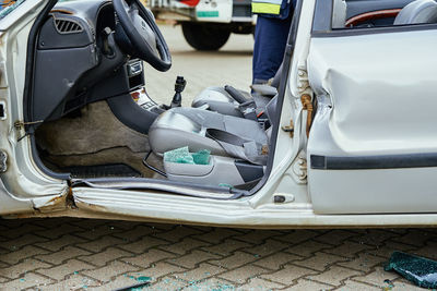 Crashed car after traffic accident on road