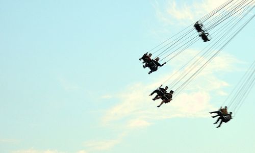 Low angle view of ferris wheel against sky