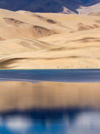 Tso moriri mountain lake panorama with mountains and blue sky reflections in the lake