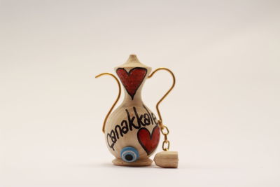 Close-up of toy against white background