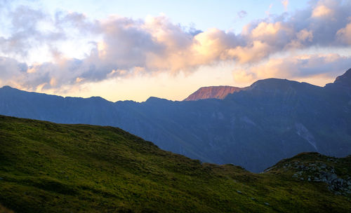 Scenic view of mountains against sky during sunset
