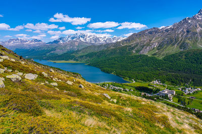 A view of lake silvaplana and the engadine from above. maloja pass.