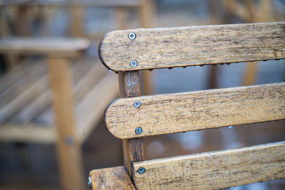 Cropped image of wooden bench