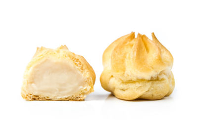 Close-up of bread against white background