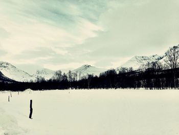 Scenic view of snow covered mountains