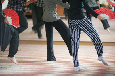 Low section of dancers practicing in studio